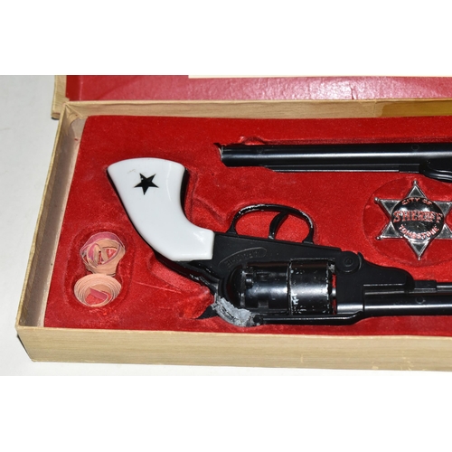 380 - A BOXED B.C.M. OUTLAW GUNS SET, comprising a pair of replica Remington Apache calibre .44 cap firing... 