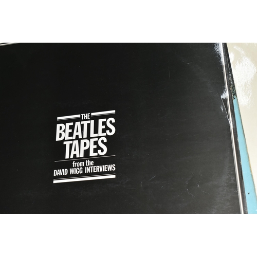 381 - A GROUP OF MOSTLY BEATLES 45 RPM SINGLES and LPS to include The Beatles White Album No. 0557801 impr... 