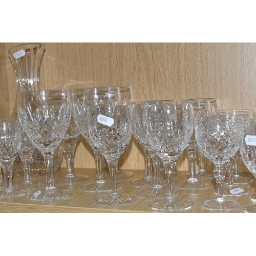 385 - A COLLECTION OF STUART CRYSTAL, mostly Glencoe pattern, comprising a carafe, four goblets, seven win... 