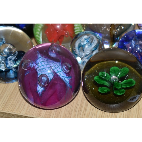 399 - A GROUP OF CAITHNESS GLASS AND OTHER PAPERWEIGHTS, to include Caithness limited editions 'Star Orchi... 