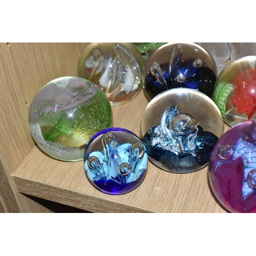 399 - A GROUP OF CAITHNESS GLASS AND OTHER PAPERWEIGHTS, to include Caithness limited editions 'Star Orchi... 