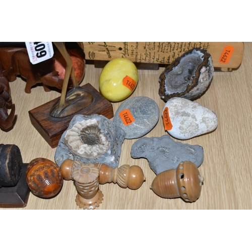 409 - A GROUP OF TREEN, FOSSILS AND GEODE, comprising an agate geode, two stone eggs, an ammonite fossil, ... 