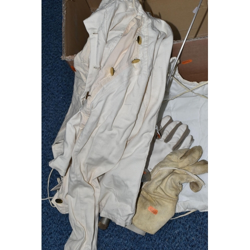 424 - A BOX OF FENCING EQUIPMENT comprising two foils marked Leon Paul No. 5, a Leon Paul guard, two glove... 