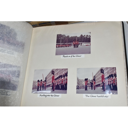 438 - A Photograph Album from The Household Division and inscribed 'Septem Juncta In Umo' comprising eight... 