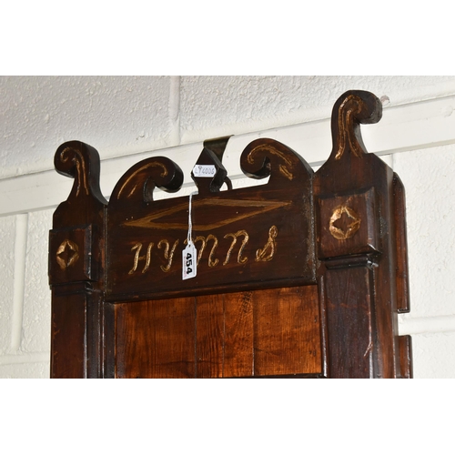 454 - A CARVED WOOD CHURCH HYMN BOARD, possibly 19th century, five shelves, carved decoration is painted i... 