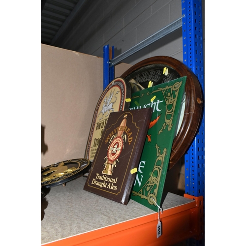 459 - A GROUP OF PUB SIGNS, to include a framed Bass mirror, (considerable damage to the frame but the mir... 