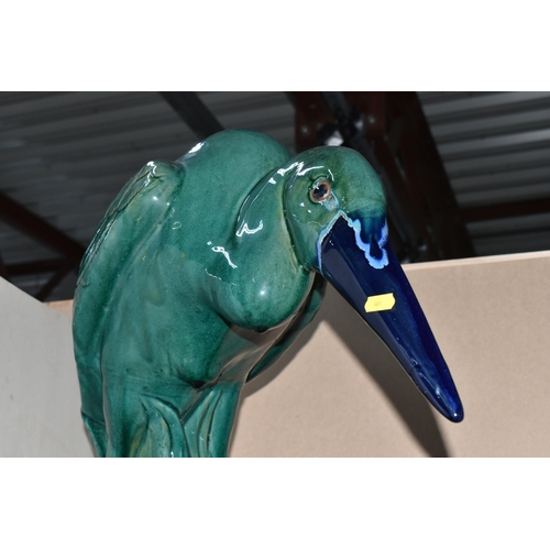 461 - LARGE CERAMIC HERON, pottery study of a heron in a natural setting of reeds, in stooped pose finishe... 