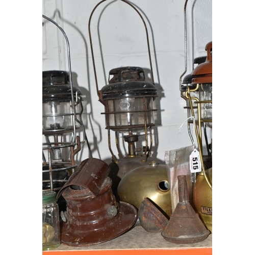 515 - A GROUP OF FIVE TILLEY LAMPS AND ASSORTED PARTS comprising five Tilley lamps in assorted colours ref... 