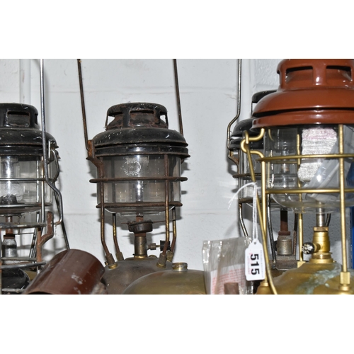 515 - A GROUP OF FIVE TILLEY LAMPS AND ASSORTED PARTS comprising five Tilley lamps in assorted colours ref... 