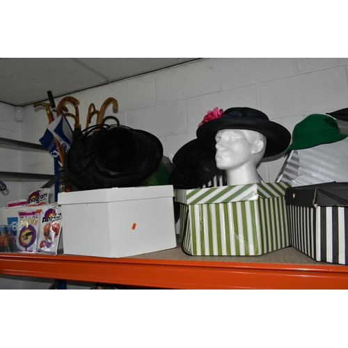 516 - SIX LADIES' HATS, A BOX OF PARTY BALLOONS, AND A GROUP OF UMBRELLAS AND STICKS to include six hats w... 