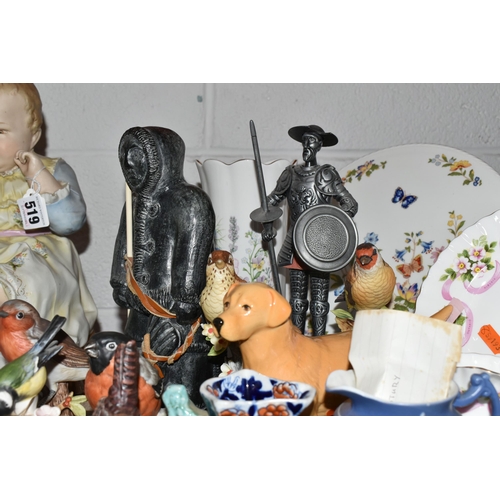 519 - A GROUP OF VARIOUS CERAMIC ORNAMENTS FROM NAMED MANUFACTURERS to include a Beswick No. 1548 Labrador... 