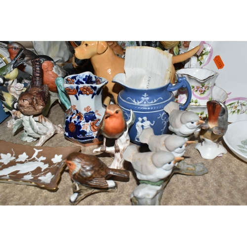 519 - A GROUP OF VARIOUS CERAMIC ORNAMENTS FROM NAMED MANUFACTURERS to include a Beswick No. 1548 Labrador... 