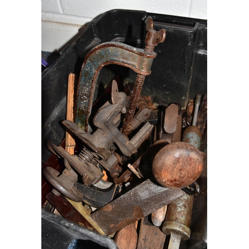 532 - TWO BOXES AND LOOSE MISCELLANEOUS ITEMS to include a box of vintage rusted tools comprising saws, pl... 