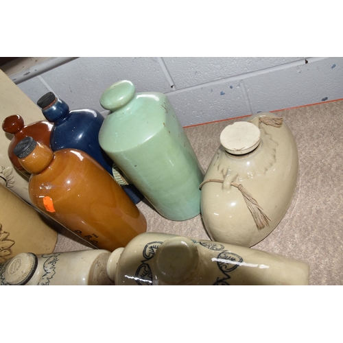 536 - A GROUP OF ELEVEN STONEWARE FOOT WARMERS, comprising two Doulton -Lambeth, a D.B.C and a Philpott's ... 