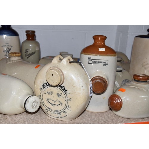 539 - A LARGE QUANTITY OF STONEWARE FOOT WARMERS, comprising twenty assorted foot warmers, maker's names i... 