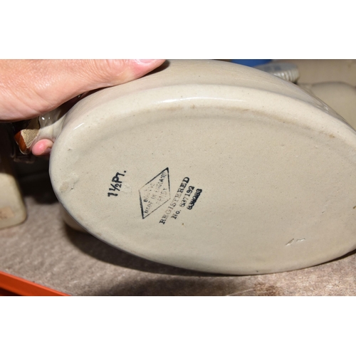 539 - A LARGE QUANTITY OF STONEWARE FOOT WARMERS, comprising twenty assorted foot warmers, maker's names i... 