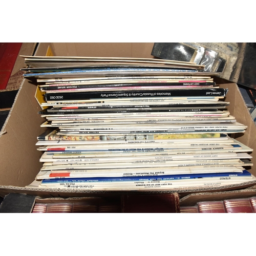 543 - SEVEN BOXES OF BOOKS, FOOTBALL PROGRAMMES, LPS AND SINGLE VINYL RECORDS, to include over fifty LP re... 