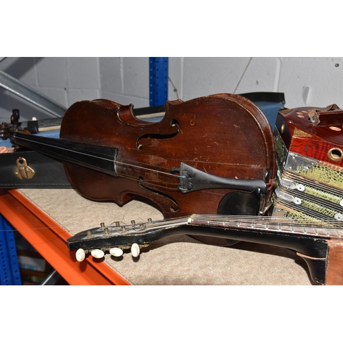 546 - A GROUP OF MUSICAL INSTRUMENTS, comprising a flat back Mandolin (Mandola), length 63cm, a Concertina... 