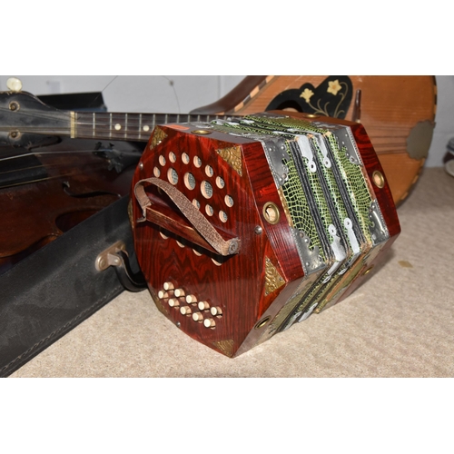 546 - A GROUP OF MUSICAL INSTRUMENTS, comprising a flat back Mandolin (Mandola), length 63cm, a Concertina... 