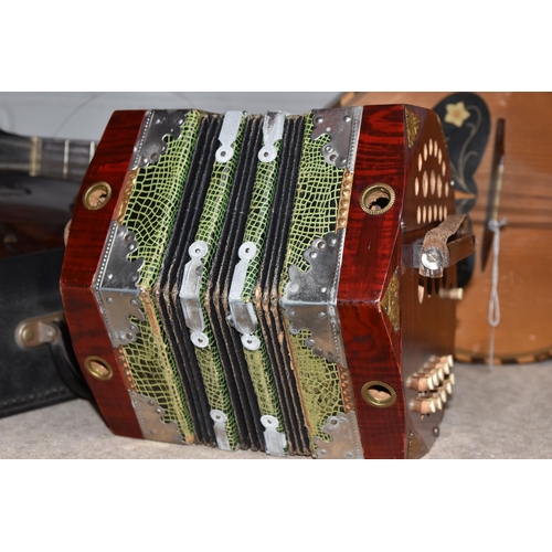 546 - A GROUP OF MUSICAL INSTRUMENTS, comprising a flat back Mandolin (Mandola), length 63cm, a Concertina... 