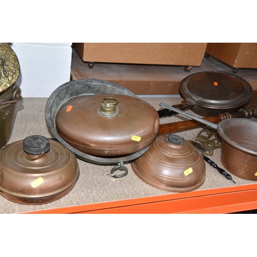 553 - A COLLECTION OF METALWARE, to include a quantity of copper items, two vintage foot warmers, two hand... 