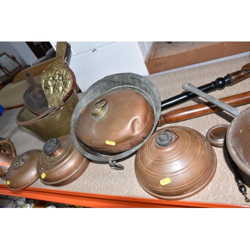 553 - A COLLECTION OF METALWARE, to include a quantity of copper items, two vintage foot warmers, two hand... 