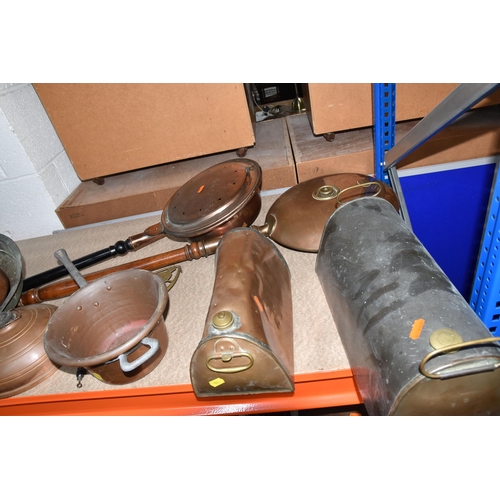 553 - A COLLECTION OF METALWARE, to include a quantity of copper items, two vintage foot warmers, two hand... 