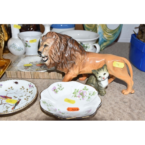 555 - A GROUP OF NAMED ORNAMENTAL CERAMICS, to include a Beswick lion and cat figurine, Royal Crafton trin... 