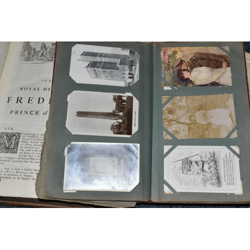 570 - TWO ANTIQUARIAN BOOKS AND AN ALBUM OF POSTCARDS, comprising an album of one hundred and forty five l... 