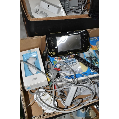 586 - FOUR BOXES OF  NINTENDO WII U AND WII CONSOLES AND GAMES, Wii U is American and comes with the game ... 