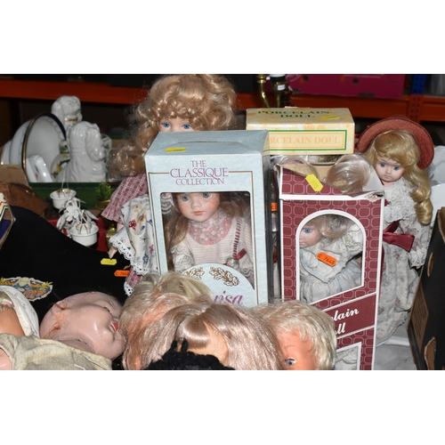 588 - FIVE BOXES AND LOOSE DOLLS, to include composition, cloth, knitted and plastic dolls, souvenir dolls... 