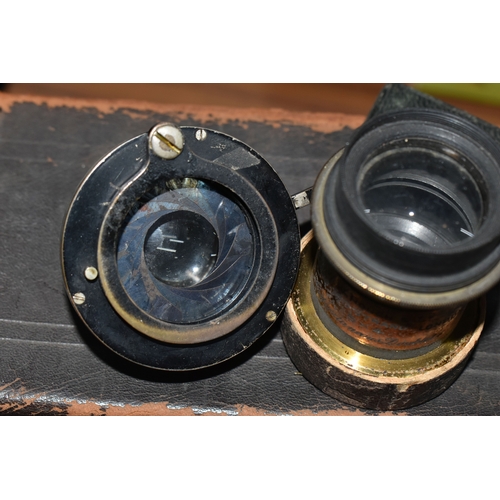 434 - A MAHOGANY QUARTER PLATE CAMERA BY W. WATSON AND SONS, with brass fittings, lens board but no lens, ... 