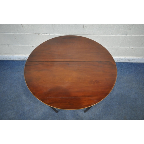 1201 - A GEORGIAN MAHOGANY DEMI-LUNE TEA TABLE, with a fold over top, foliate inlay, raised on square taper... 