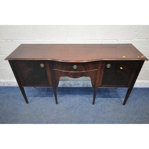 1208 - A REPRODUCTION MAHOGANY OVAL EXTENDING DINING TABLE, with one additional leaf, raised on four shaped... 