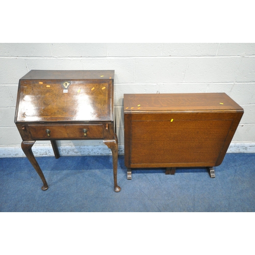 1214 - AN EARLY 20TH CENTURY WALNUT BUREAU, the fall front door enclosing a fitted interior, above a single... 