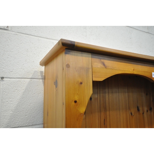 1221 - A MODERN PINE OPEN BOOCKASE, fitted with three shelves, above a single drawer, width 93cm x depth 30... 