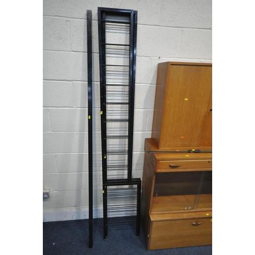 1227 - A STAPLES MODULAR LADDERAX SYSTEM, comprising two uprights, a section with a fall front door, one wi... 