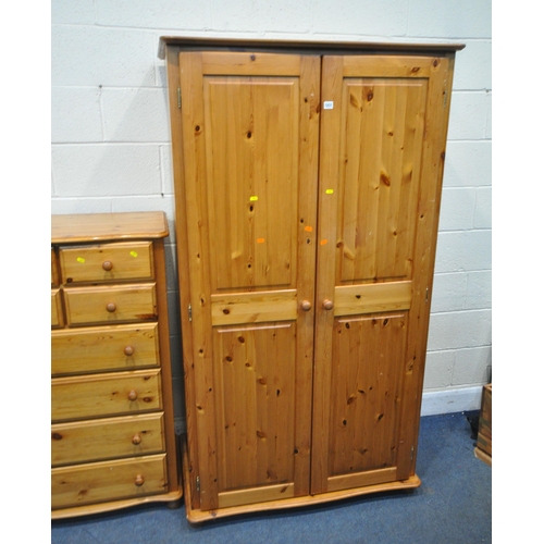 1231 - A MODERN PINE DOUBLE DOOR WARDROBE, width 105cm x depth 61cm x height 187cm, a chest of four short o... 