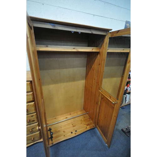 1231 - A MODERN PINE DOUBLE DOOR WARDROBE, width 105cm x depth 61cm x height 187cm, a chest of four short o... 