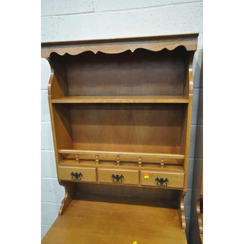 1235 - TWO MODERN DRESSERS, one plate rack with three drawers, atop a base with three drawers and double cu... 