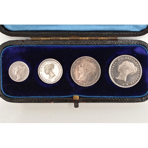 146 - A CASED SET OF MAUNDY COINS VICTORIA 1882 4d-1d