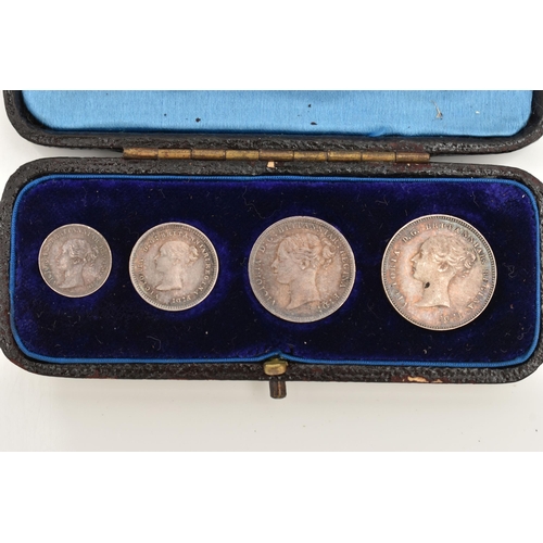 148 - A CASED SET OF MAUNDY COINS VICTORIA 1884 4d-1d