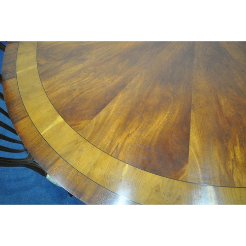 1238 - POSSIBLY REPRODUX, A LARGE CIRCULAR MAHOGANY TABLE, with yew wood inlay, raised on a single pedestal... 