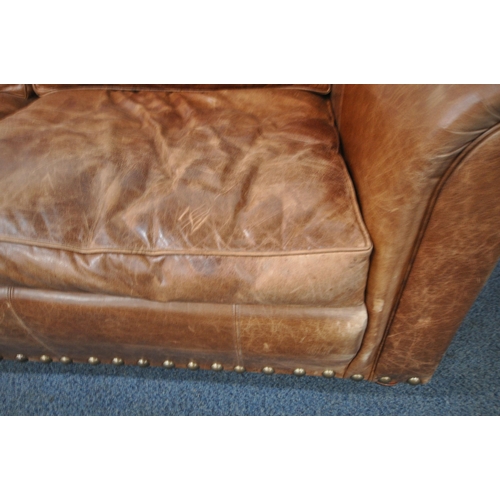 1246 - A WADE UPHOLSTERY BROWN LEATHER TWO PIECE LOUNGE SUITE, comprising a two seater settee, length 198cm... 