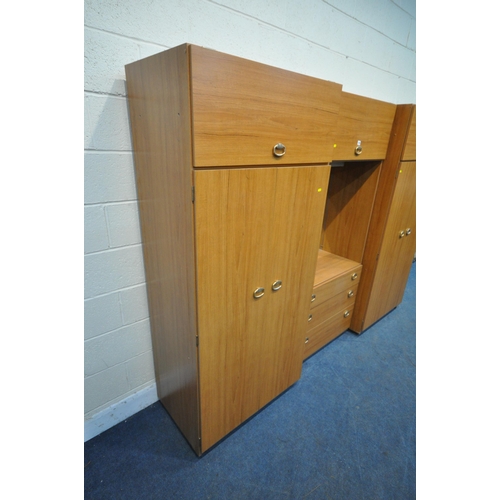 1259 - A SCHREIBER MID CENTURY TEAK EFFECT THREE PIECE BEDROOM FITMENT, comprising a pair of double door wa... 