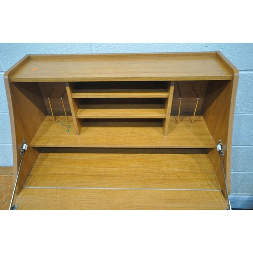 1269 - A LATE 20TH CENTURY BUREAU, the fall front door enclosing a fitted interior, above a single drawer a... 