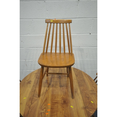 1271 - A 20TH CENTURY FORMICA DROP LEAF TABLE, diameter 106cm x height 74cm, along with a set of four spind... 