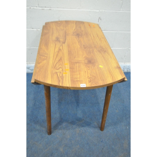 1271 - A 20TH CENTURY FORMICA DROP LEAF TABLE, diameter 106cm x height 74cm, along with a set of four spind... 