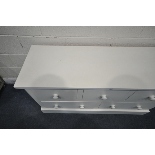 1286 - A WHITE PAINTED SIDEBOARD / BANK OF FIVE DRAWERS, width 138cm x depth 47cm x height 77cm, along with... 