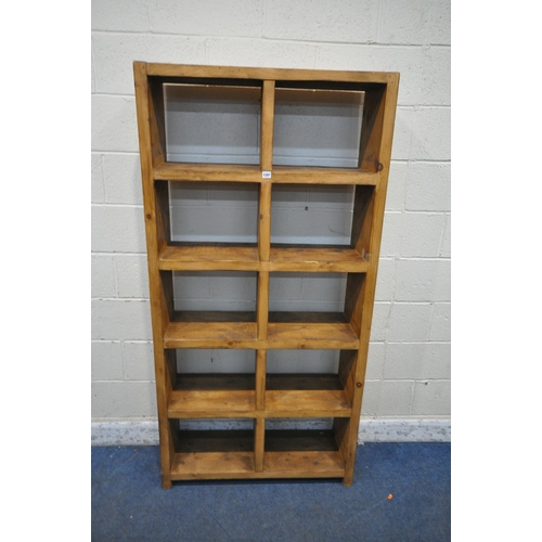 1287 - A MODERN CORONA PINE STORAGE CABINET, with ten divisions, width 91cm x depth 31cm x height 183cm (co... 